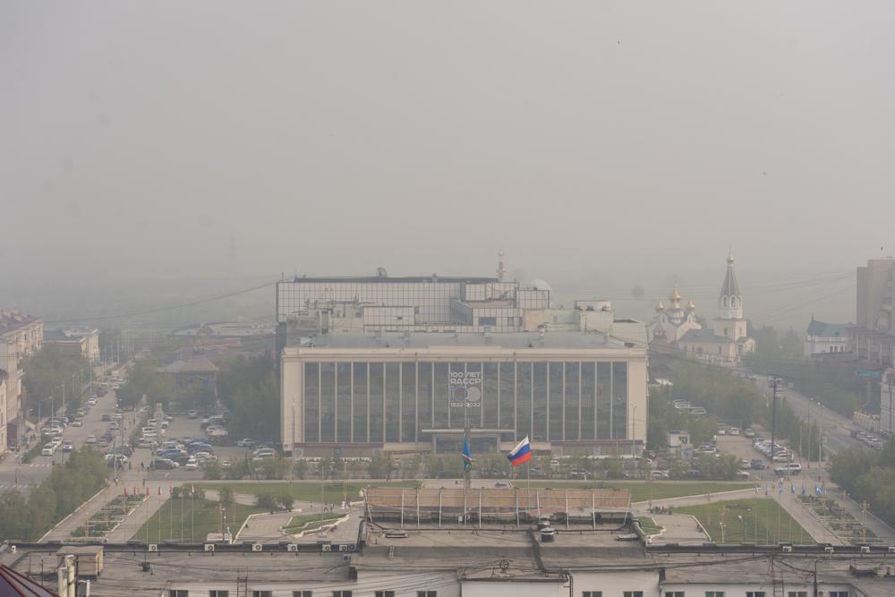 Smoke from a forest fire covers Yakustk, the capital of the republic of Sakha also known as Yakutia, Russia Far East, on 19 July 2021. Each year, thousands of wildfires engulf wide swathes of Russia, destroying forests and shrouding broad territories in acrid smoke. The summer of 2021 has seen particularly massive fires in Yakutia in northeastern Siberia following unprecedented heat. Photo: Yevgeny Sofroneyev / AP