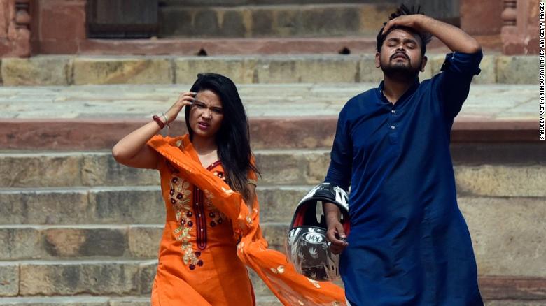 Visitors at Humayun's Tomb on a hot summer day on 30 June 2021 in New Delhi, India. As the monsoon continued to play truant, the heatwave in Delhi NCR turned severe recording the highest maximum temperature of the season at 43.5 degree Celsius. Photo: Sanjeev Verma / Hindustan Times / Getty Images