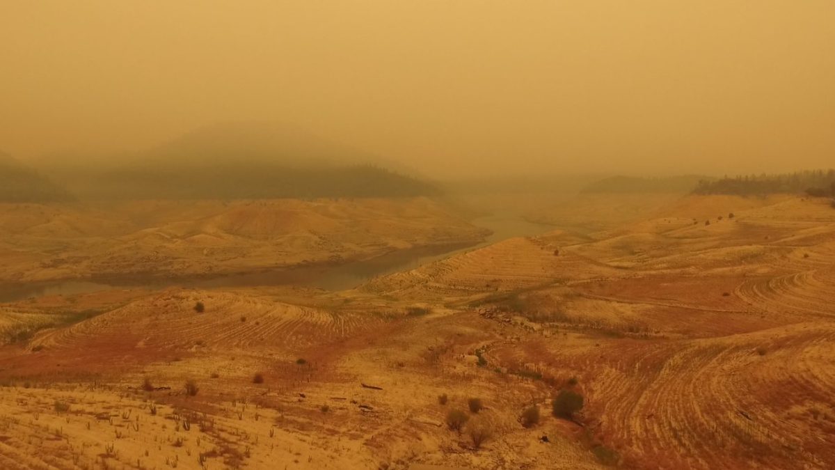 Aerial view of Lake Oroville, seen through a thick haze of smoke from California wildfires, on 20 August 2021. Lake Oroville has a surface area of 15,000 acres but is facing the worst crisis in its 52-year history. Photo: Action News Now