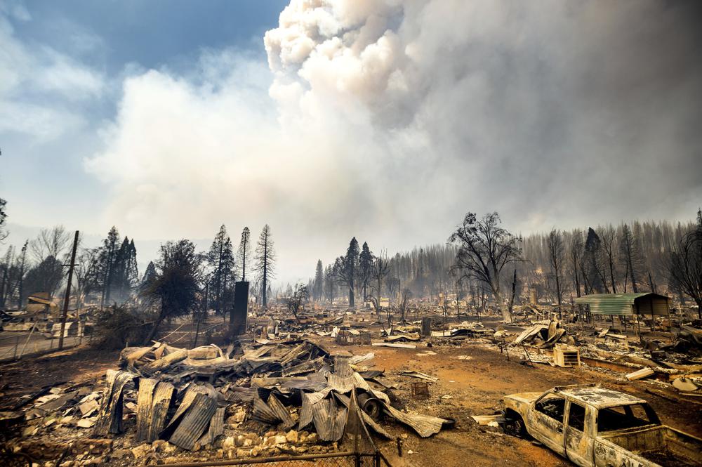 Cars and homes destroyed by the Dixie Fire line central Greenville on Thursday, 5 August 2021, in Plumas County, California. Photo: Noah Berger / AP Photo
