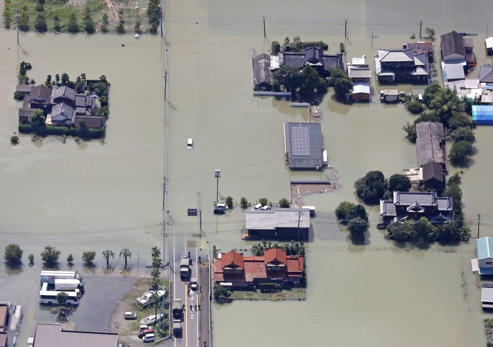 Aerial view from a Kyodo News helicopter on 15 August 2021 shows the flooded Saga Prefecture city of Takeo in southwestern Japan, following record-breaking rain. Photo: Kyodo News