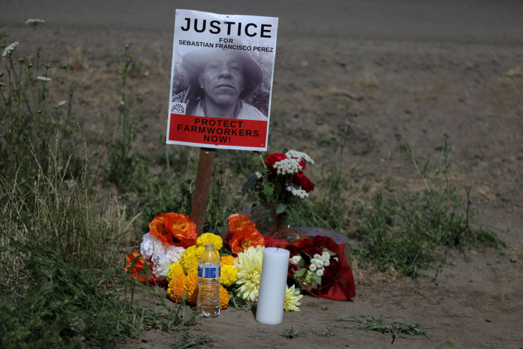 A water bottle is placed at a small vigil for Sebastian Francisco Perez as the community gathers to remember him at Ernst Nursery and Farm in Saint Paul, Oregon on Saturday, 3 July 2021. Mr. Perez was found unresponsive in a field around 3:30 p.m. on 26 June 2021, during the record heatwave, according to the St. Paul Fire District. OSHA has opened investigations into Ernst Nursery and Farms and Brother Farm Labor Contractor, who provided workers to the nursery. Photo: Brian Hayes / Statesman Journal / Imagn