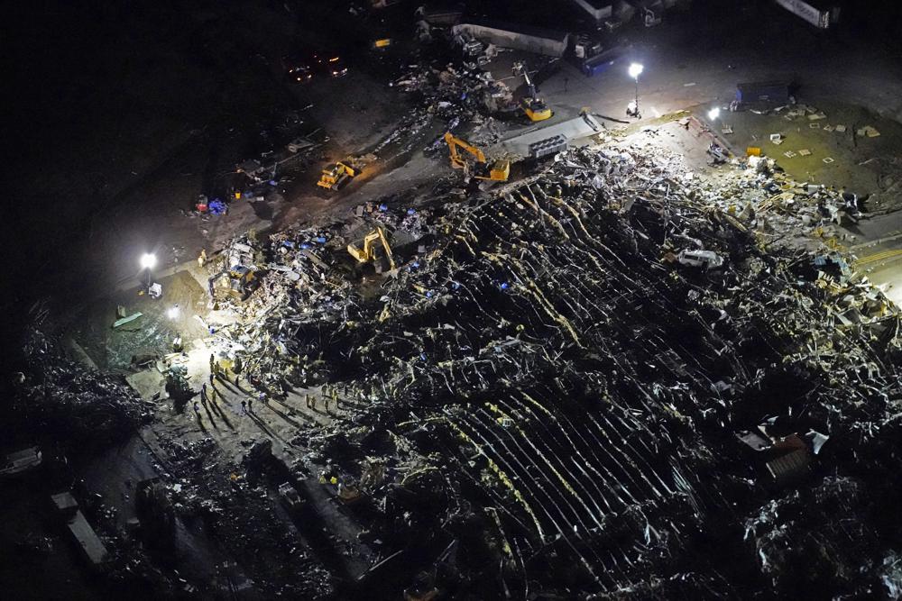Aerial view of a collapsed candle factory with workers searching for survivors, after tornadoes came through the area the previous night, in Mayfield, Kentucky, Saturday, 11 December 2021. Photo: Gerald Herbert / AP Photo