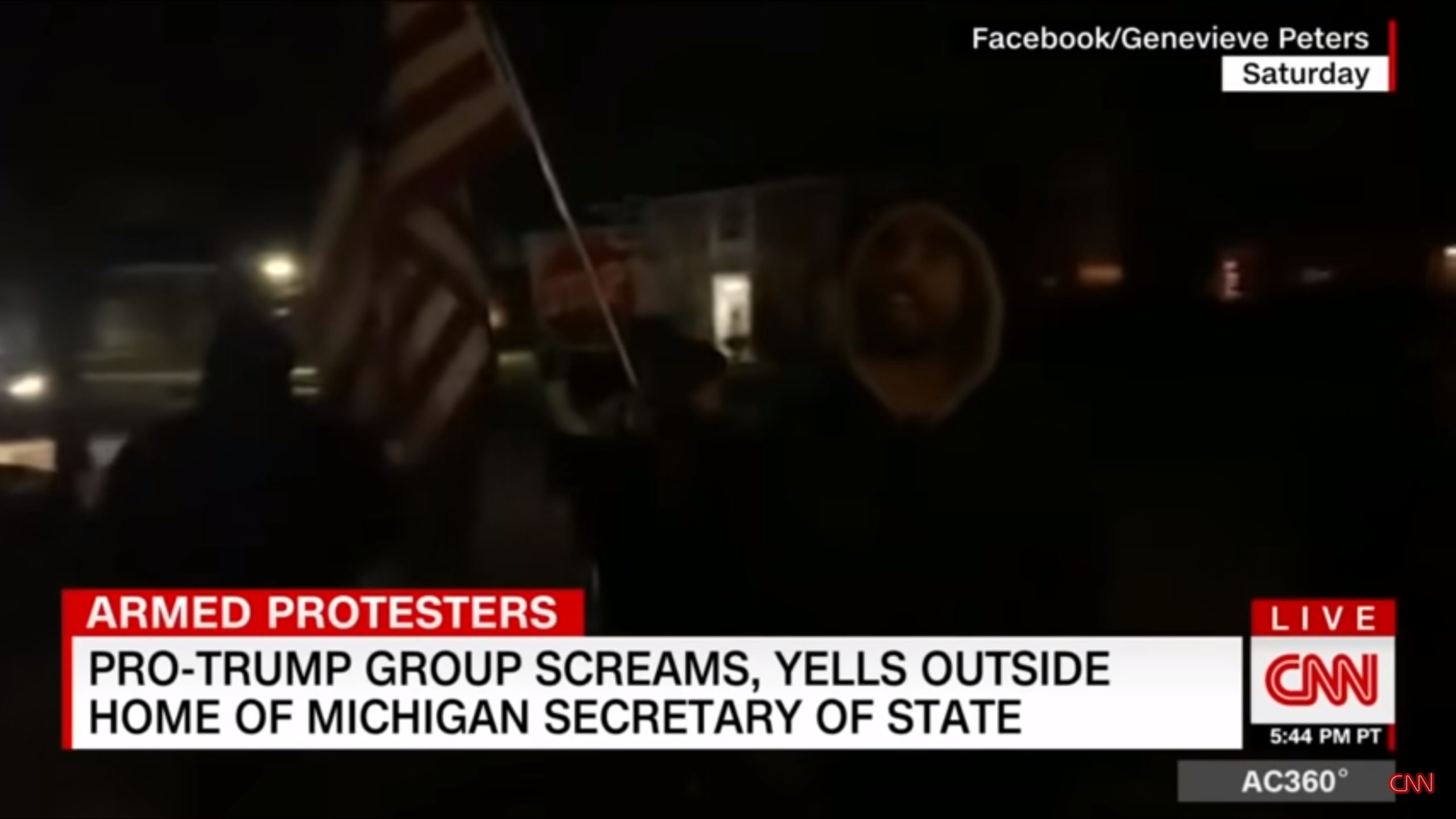 Armed Trump coup supporters surround the home of Michigan Secretary of State Jocelyn Benson on 5 December 2020, as part of an organized harassment and intimidation campaign planned by convicted felon Bernard Kerik and other Trump insurrectionists. Photo: Genevieve Peters / Facebook / CNN