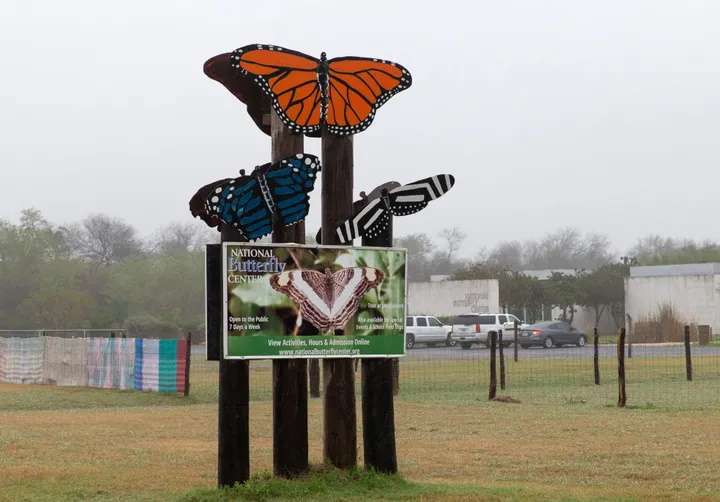 The entry to the National Butterfly Center in Mission, Texas. The center is north of the Rio Grande, which forms a border with Mexico, and is under continuous threat from QAnon and MAGA conspiracy theorists. Photo: Suzanne Cordeiro / Getty Images