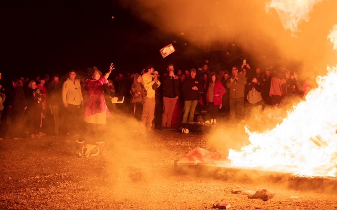 Followers of Tennessee pastor and pro-Trump conspiracy theorist Greg Locke burn books on 2 February 2022. The books included Millennial staples like Harry Potter and Twilight. Photo: Tyler Salinas / Nashville Scene