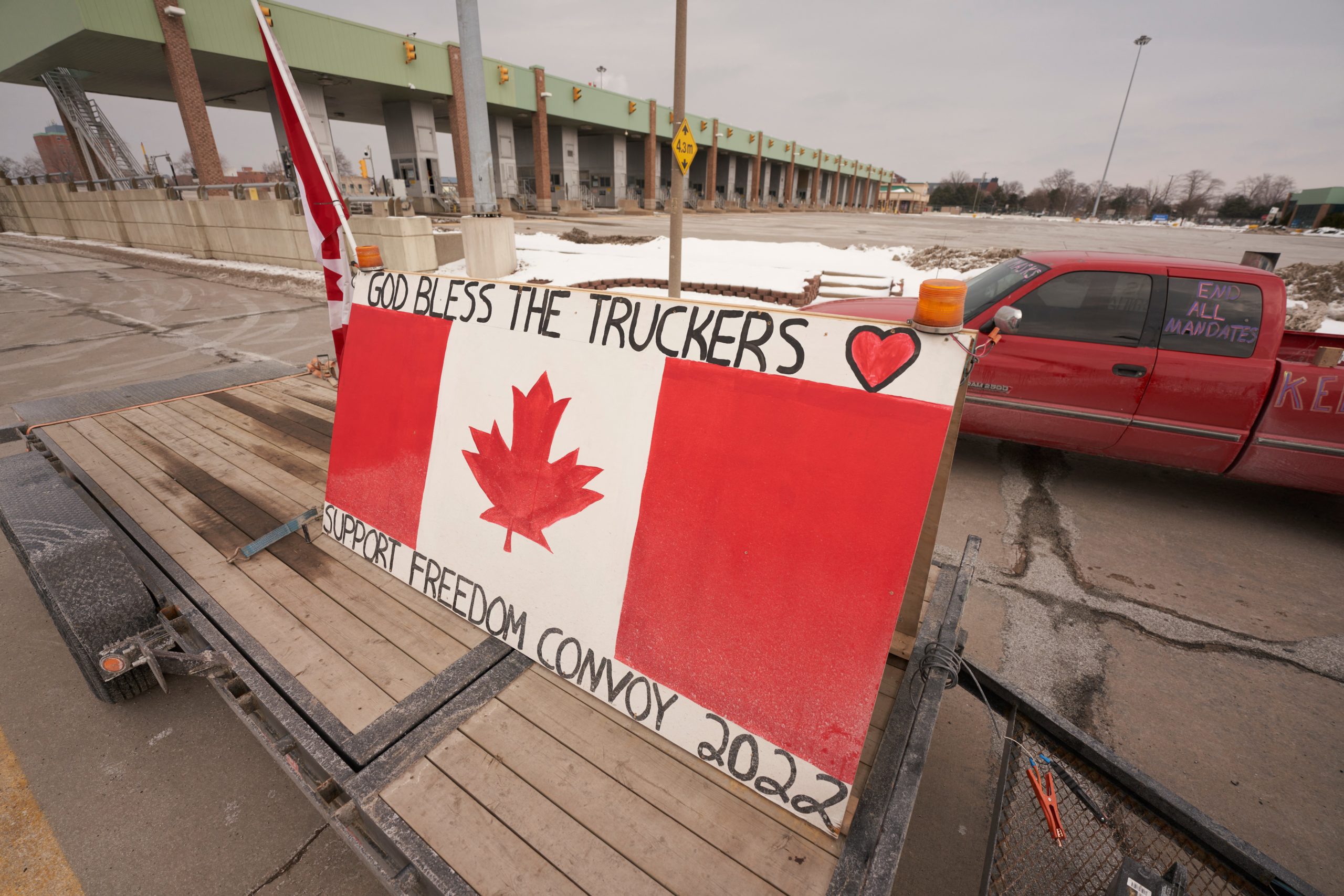A trailer indicating support for anti-vax Freedom Convoy blocks the highway close to the Customs Inspection cubicles throughout a protest towards COVID-19 vaccine mandates on the Ambassador Bridge border crossing, in Windsor, Ontario, on 8 February 2022. The protestors, helping the Truckers Convoy in Ottawa, blocked visitors within the Canada certain lanes since the night of 8 February 2022. Roughly $323 million price of products cross the Windsor-Detroit border every day on the Ambassador Bridge, making it North America’s busiest worldwide border crossing. Photo: AFP