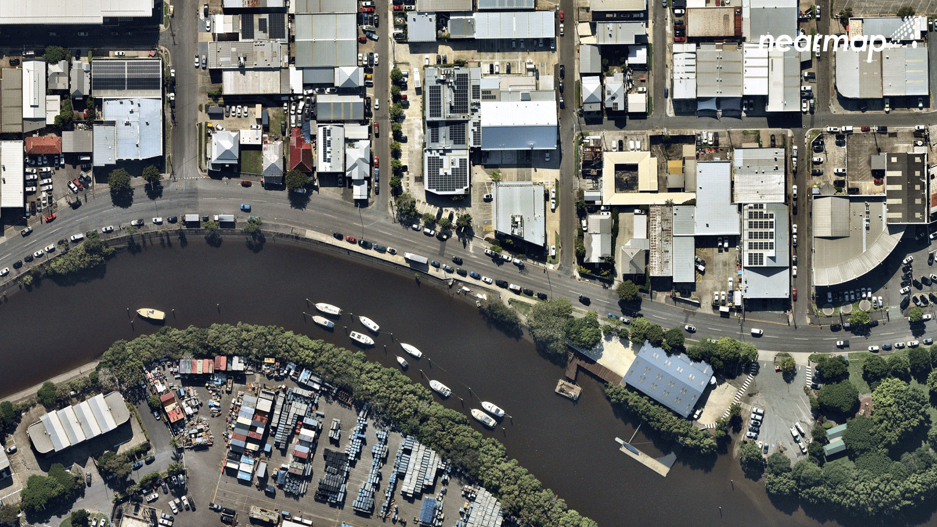 Aerial view of the town of Albion, Queensland on 24 January 2022 compared with 2 March 2022 (after flooding). The images were captured by the Nearmap proprietary aerial camera system attached to planes. Photo: Nearmap / The Washington Post