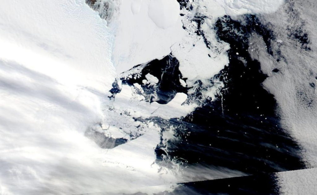 Satellite view of the Conger/Glenzer (Bowman Island) ice shelf collapse on 16 March 2022. This satellite image provided by NASA shows the C-38 iceberg in one piece chasing the main piece of C-37 moving west on the coastal current. Photo: NASA / AP