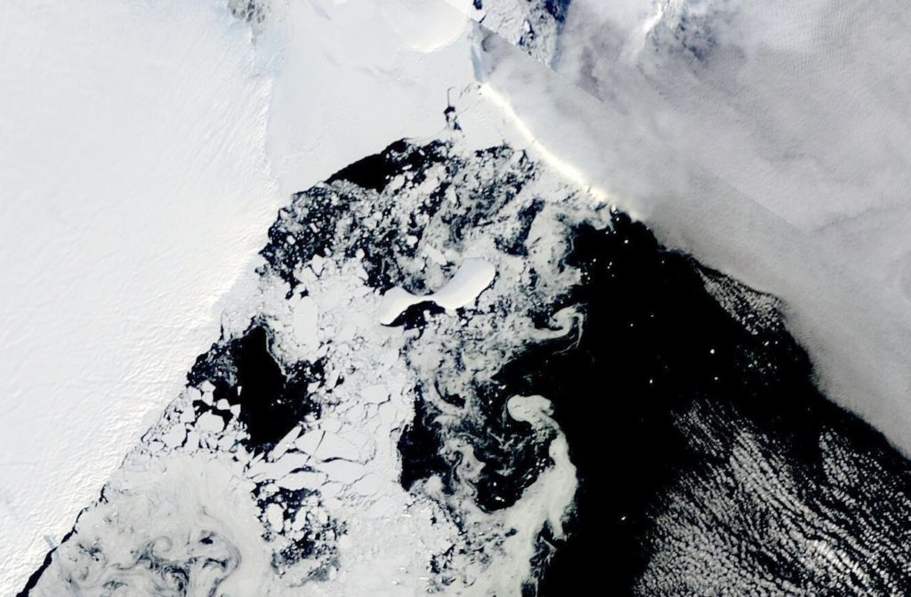 Satellite view of the Conger/Glenzer (Bowman Island) ice shelf collapse on 16 March 2022. This satellite image provided by NASA shows shows the two pieces of C-38 (A and B icebergs) next to the main piece of C-37 at the top. Photo: NASA / AP