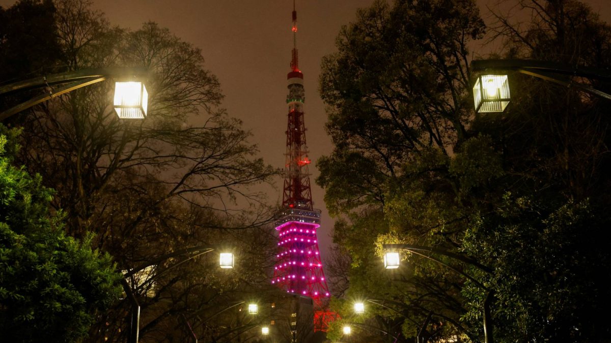 Tokyo Tower is illuminated only in the lower-half part in response to the government’s request to save electricity in Tokyo, Japan on 22 March 2022. Photo: Issei Kato / REUTERS