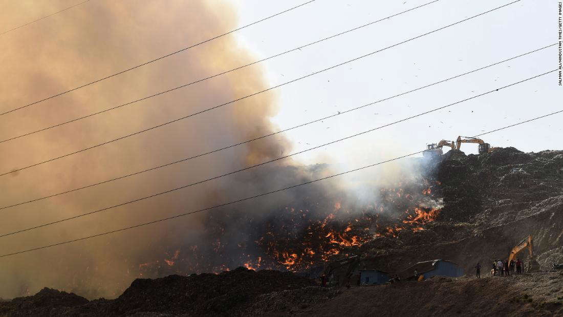 Firefighters battle a blaze at the Ghazipur landfill in New Delhi, India, on 28 March 2022. Photo: Salman Ali / Hindustan Times / Getty Images