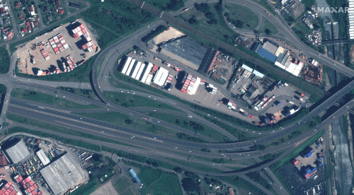 Satellite view of container yards with strewn shipping containers in Durban, South Africa, after record flooding, 14 April 2022 Photo: Maxar Technologies