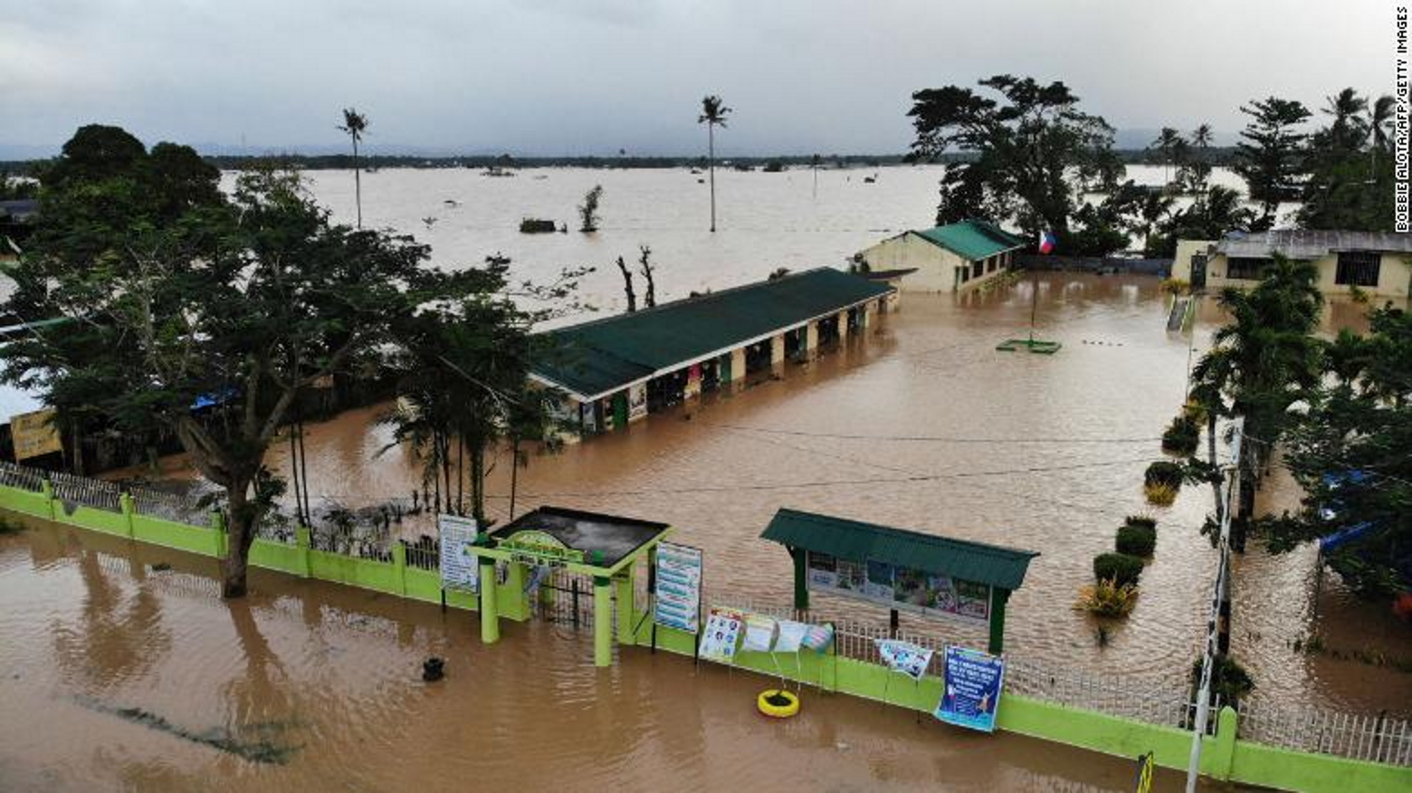 A school is submerged by floodwaters in Leyte province, southern Philippines, on 11 April 2022, following heavy rains brought by tropical storm Megi. Photo: Bobbie Alota / AFP / Getty Images