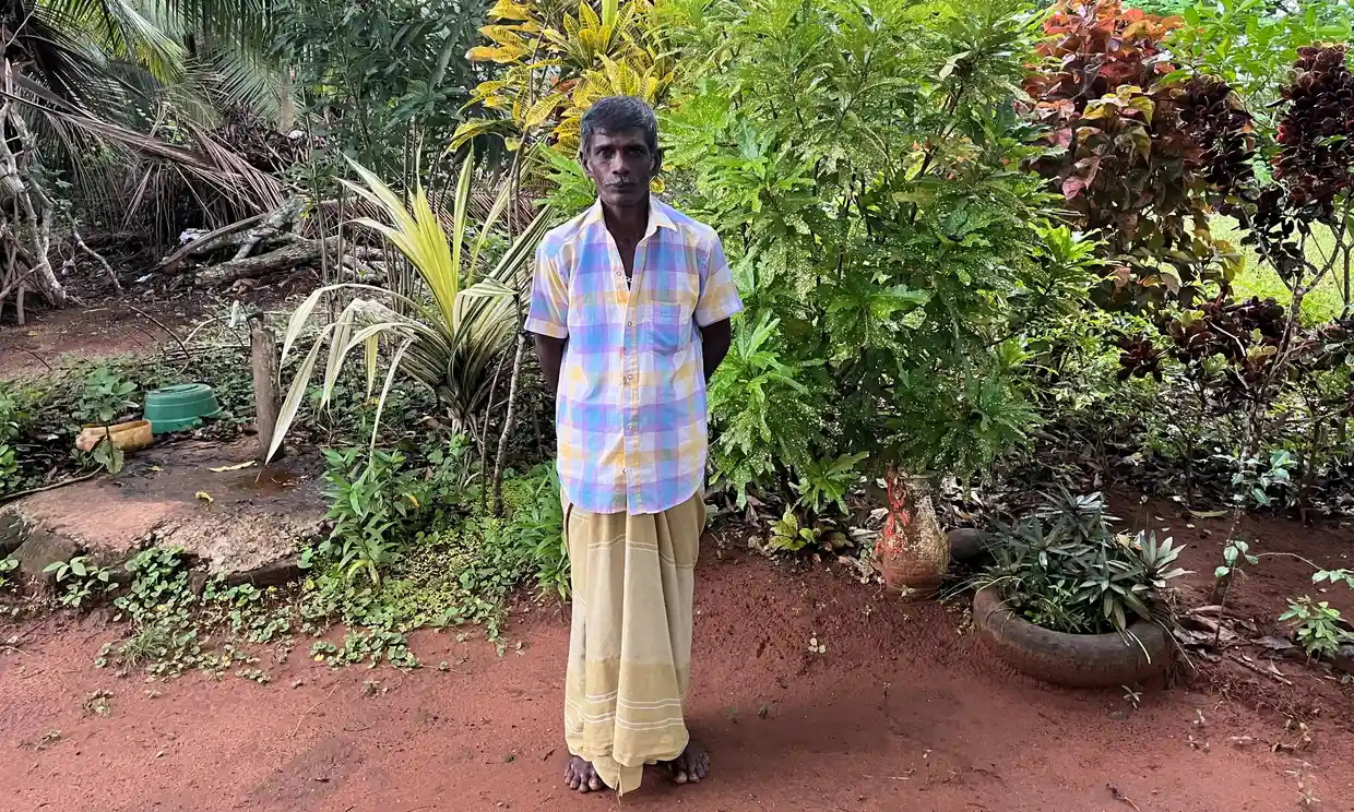 Sri Lanka farmer HP Sarah Dharmasiri says the government chemical pesticide ban and high prices are forcing him to abandon farming and become a laborer. Photo: Hannah Ellis-Petersen / The Guardian
