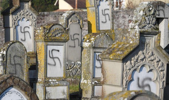 Vandals defaced Jewish gravestones with swastikas and anti-Semitic graffiti at a Jewish cemetery near Strasbourg in eastern France, 3 December 2019. Photo: AFP