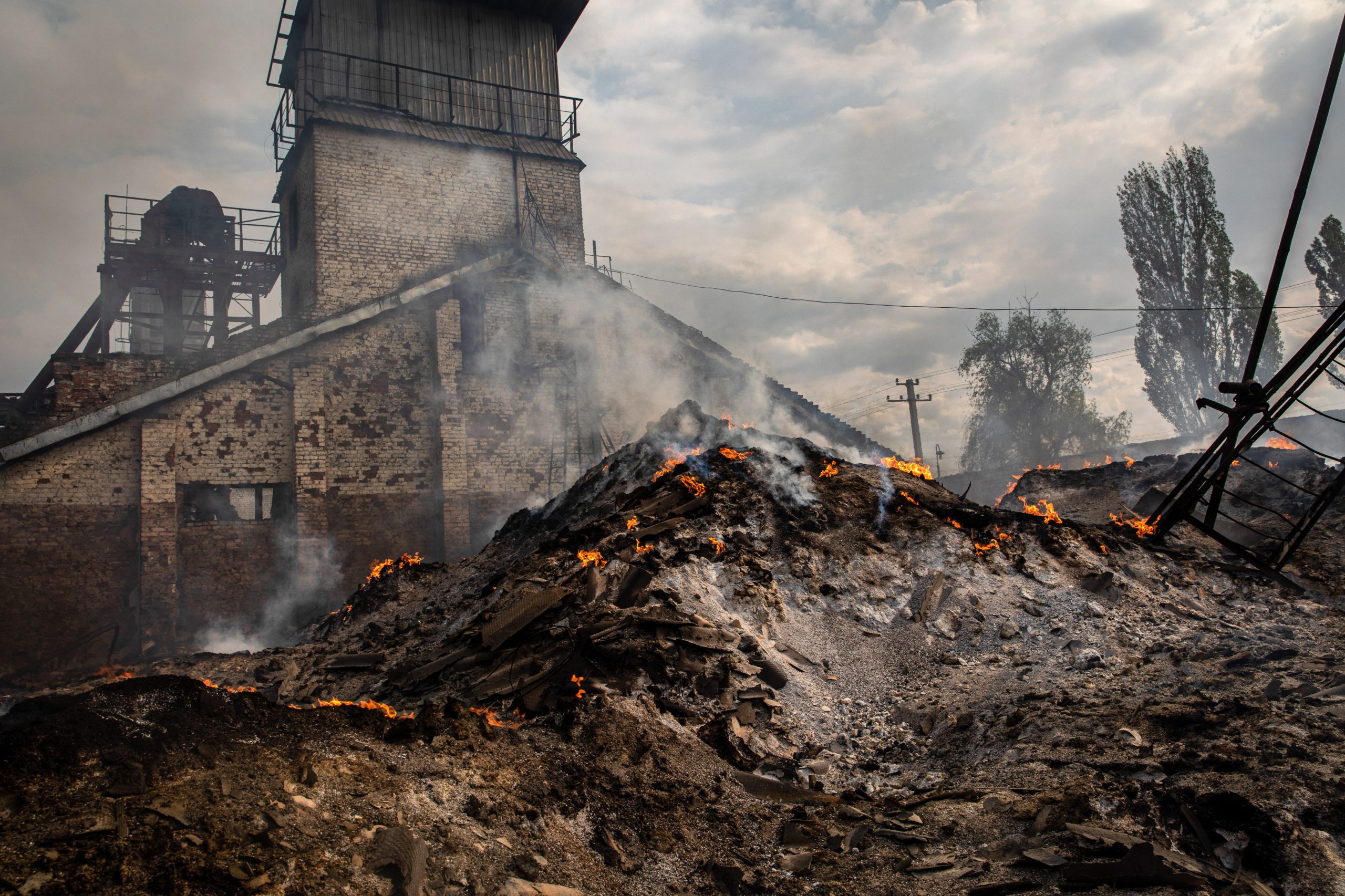 The ashes of burnt grain can be seen in a grain silo in the town of Sivers’k, Donbas in May 2022. Photo: Alex Chan / SOPA Images / Sipa USA / Reuters