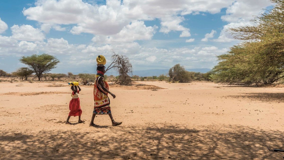 Esther Elaar, a pregnant mother living in Loima, Turkana County, Northern Kenya, fetches and carries 20 litres of water for her family to use every day. Photo: BBC Media Action