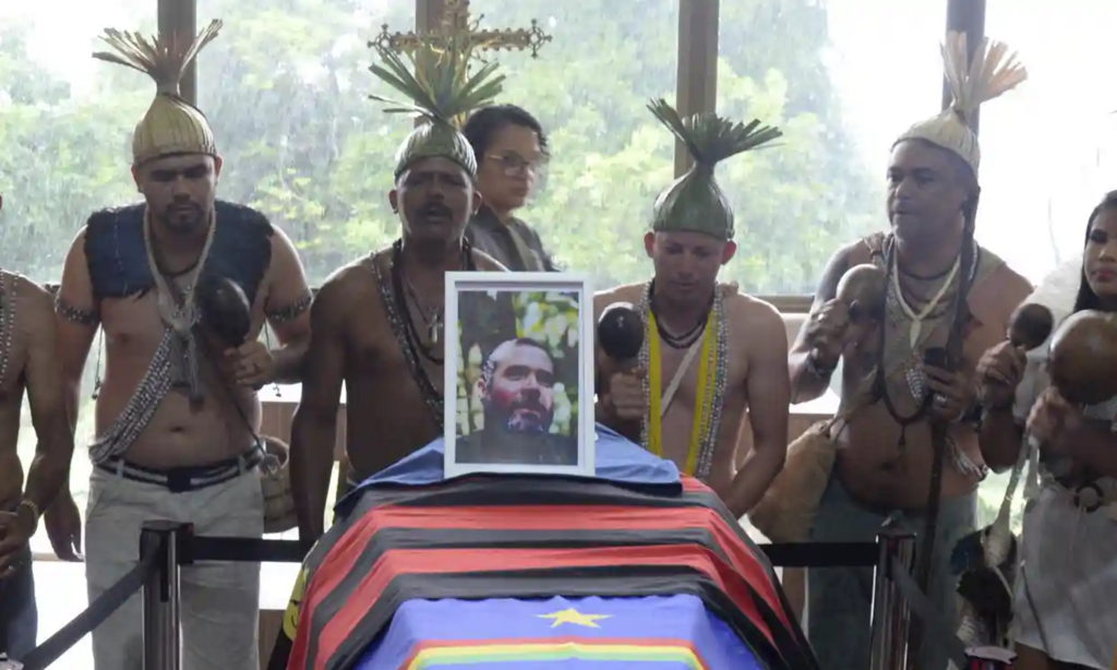 Members of the Xukuru Indigenous tribe at Bruno Pereira’s funeral at the Morada da Paz cemetery in Recife, Pernambuco state, Brazil, on 24 June 2022. Photo: Teresa Maia / AP