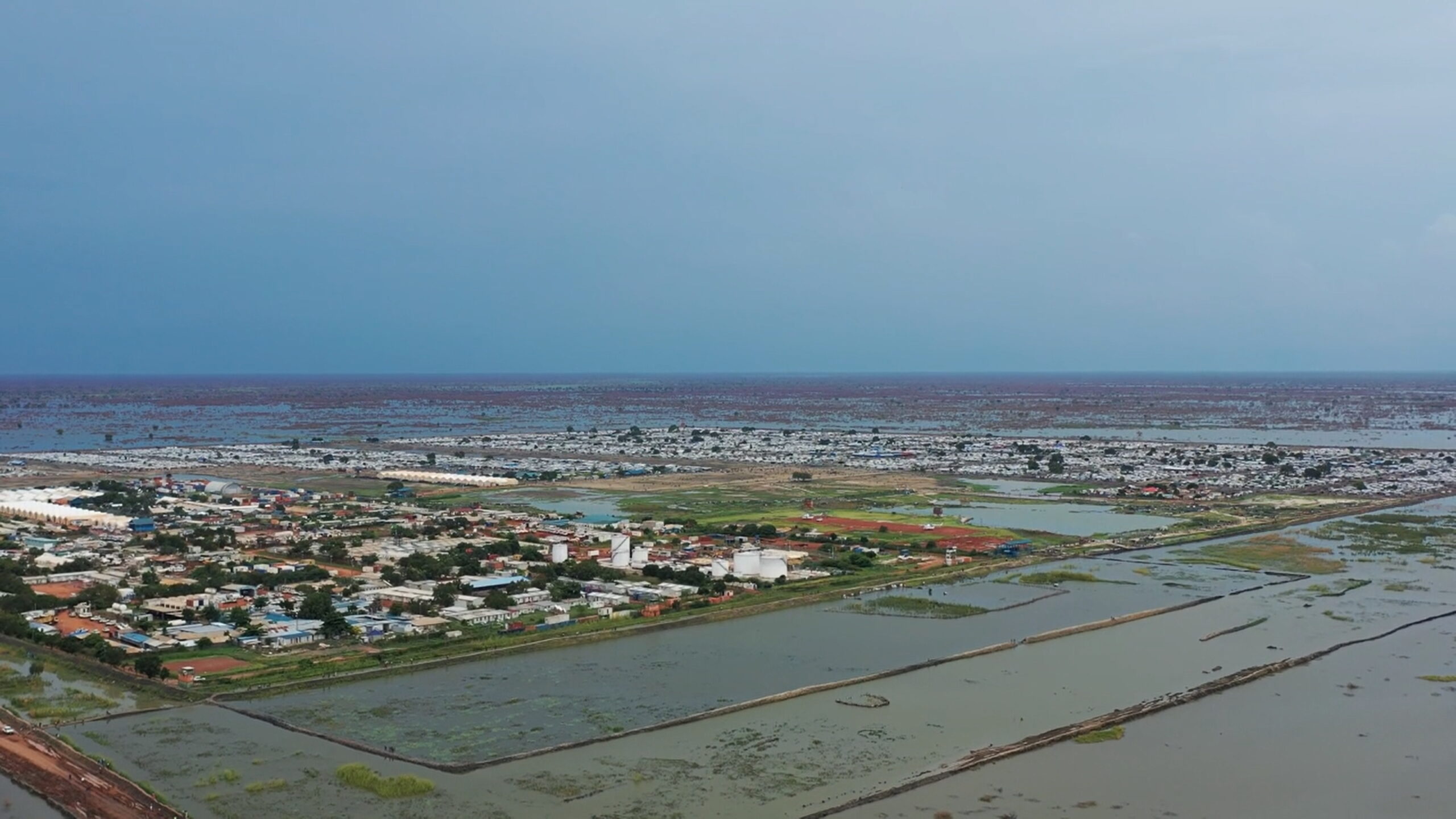 Aerial view of South Sudan’s capital, Bentiu, which became an island surrounded by floodwaters after record-breaking rains in October 2022. Photo: Charlotte Hallqvist / UNHCR