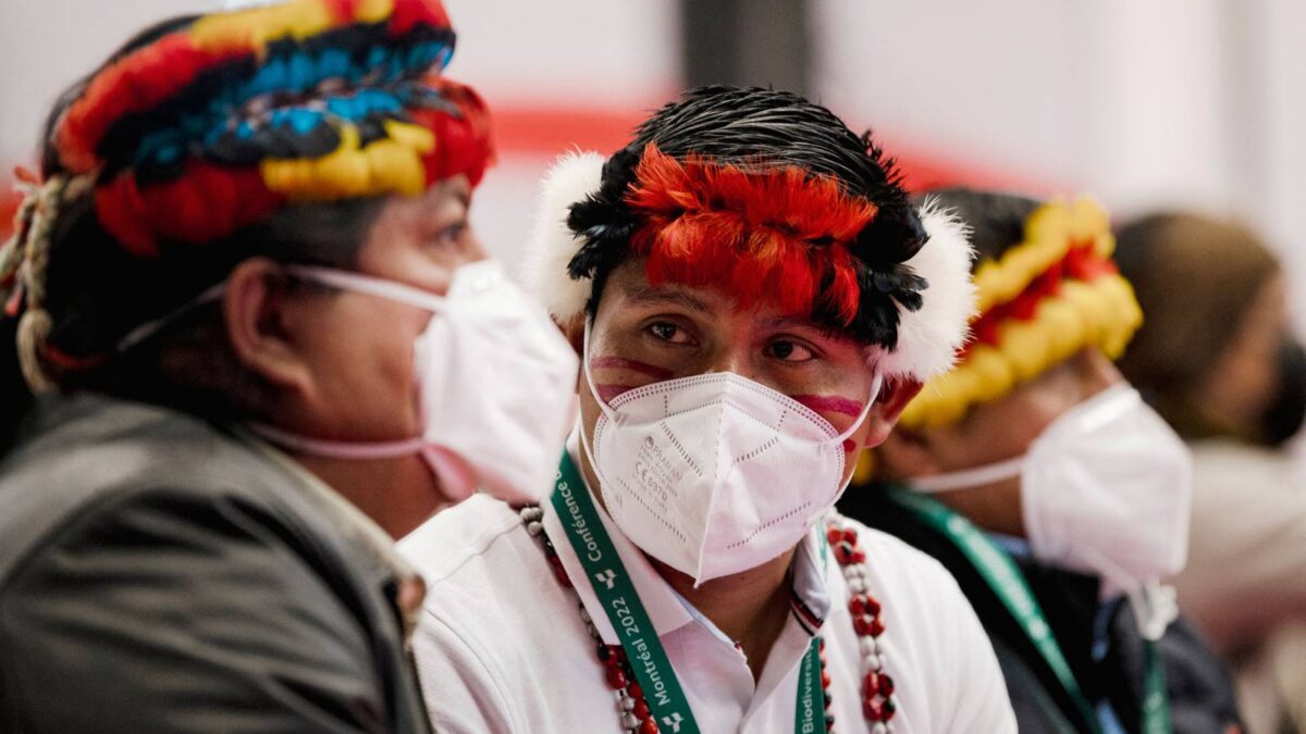 Members of the Wampis Nation Peru listen as Indigenous representatives of Latin American countries hold a press conference during the United the Nations Biodiversity Conference (COP15) in Canada in December 2022. Photo: Andrej Ivanov / Getty Images