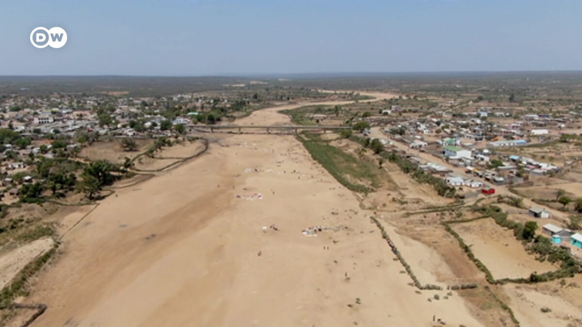Aerial view of the dried-up Manambovo River in Tsihombe, Madagascar in November 2022. Its dry bed is pocked with holes dug by desperate residents searching for water. Photo: DW