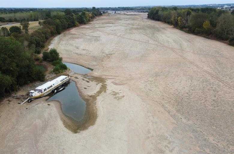 An aerial view shows a branch of the Loire River as historical drought hits France, in Loireauxence, France, 16 August 2022. Photo: Stephane Mahe / REUTERS
