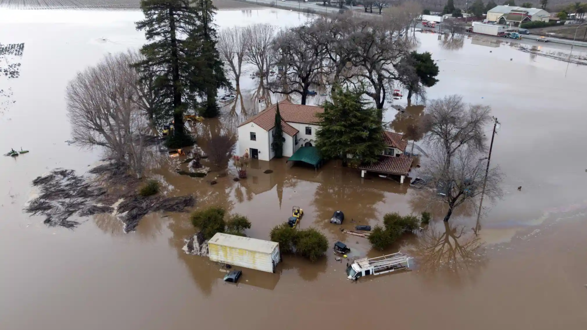 Aerial view of a flooded home that is partially underwater in Gilroy, California, on 9 January 2023. Photo: Josh Edelson / AFP / Getty Images