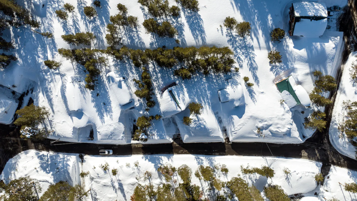 Aerial view of homes buried in snow in Soda Springs, California in March 2023. Photo: Josh Edelson / The Washington Post