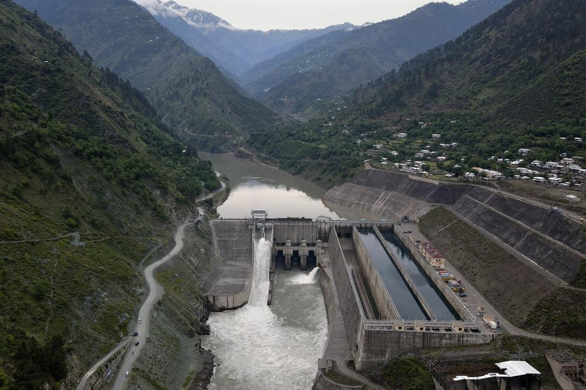 The main dam of the Neelum-Jhelum Hydropower Project is seen in Nauseri, Pakistan, near Muzaffarabad, the capital of Pakistan administrated Kashmir, Thursday, 4 May 2023. The power plant, built by a Chinese consortium, had to be shut down for fear it could collapse. Photo: Shahzaib Afzal / AP Photo
