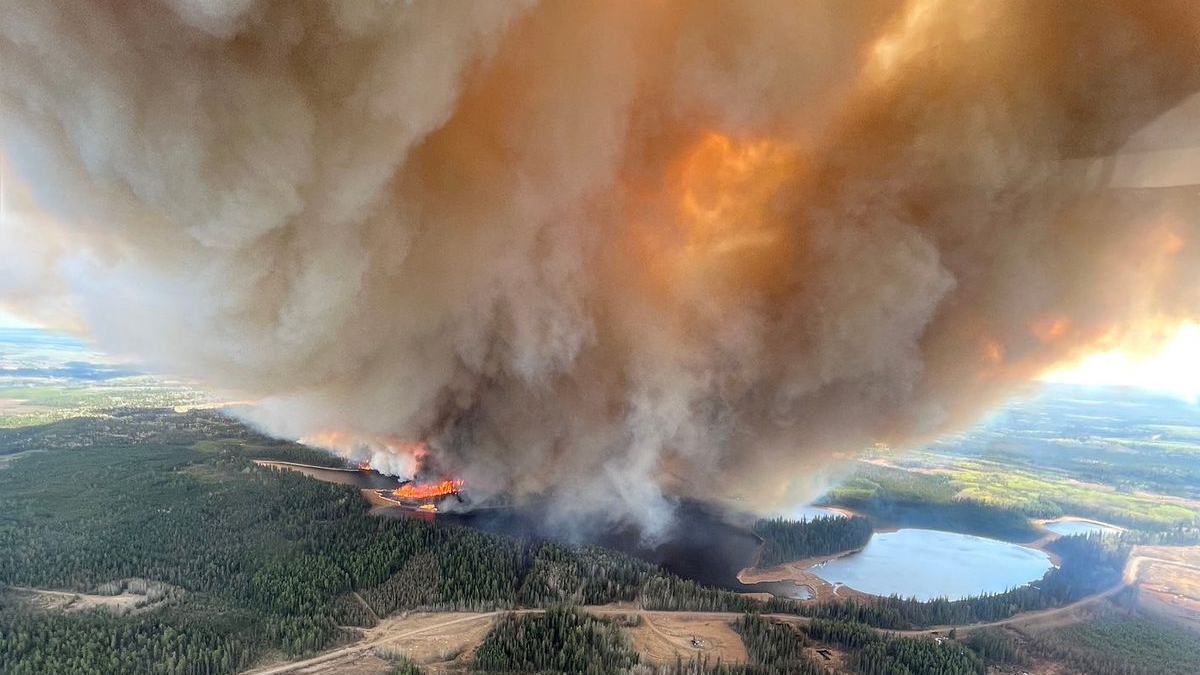 A smoke column rises from wildfire EWF031 near Lodgepole, Alberta, Canada 4 May 2023. Photo: Alberta Wildfire / REUTERS