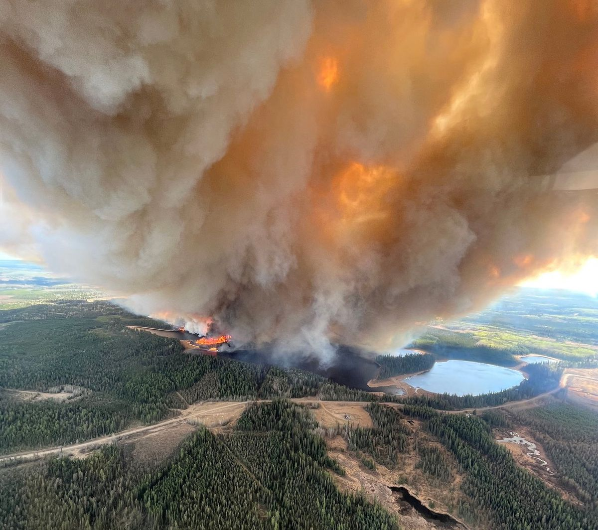 A smoke column rises from wildfire EWF031 near Lodgepole, Alberta, Canada 4 May 2023. Photo: Alberta Wildfire / REUTERS