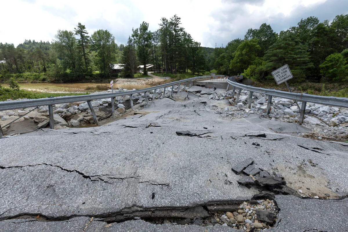A road and bridge over the Black River is washed out in Cavendish, Vermont, on 13 July 2023. Photo: CJ Gunther / EPA-EFE / Shutterstock
