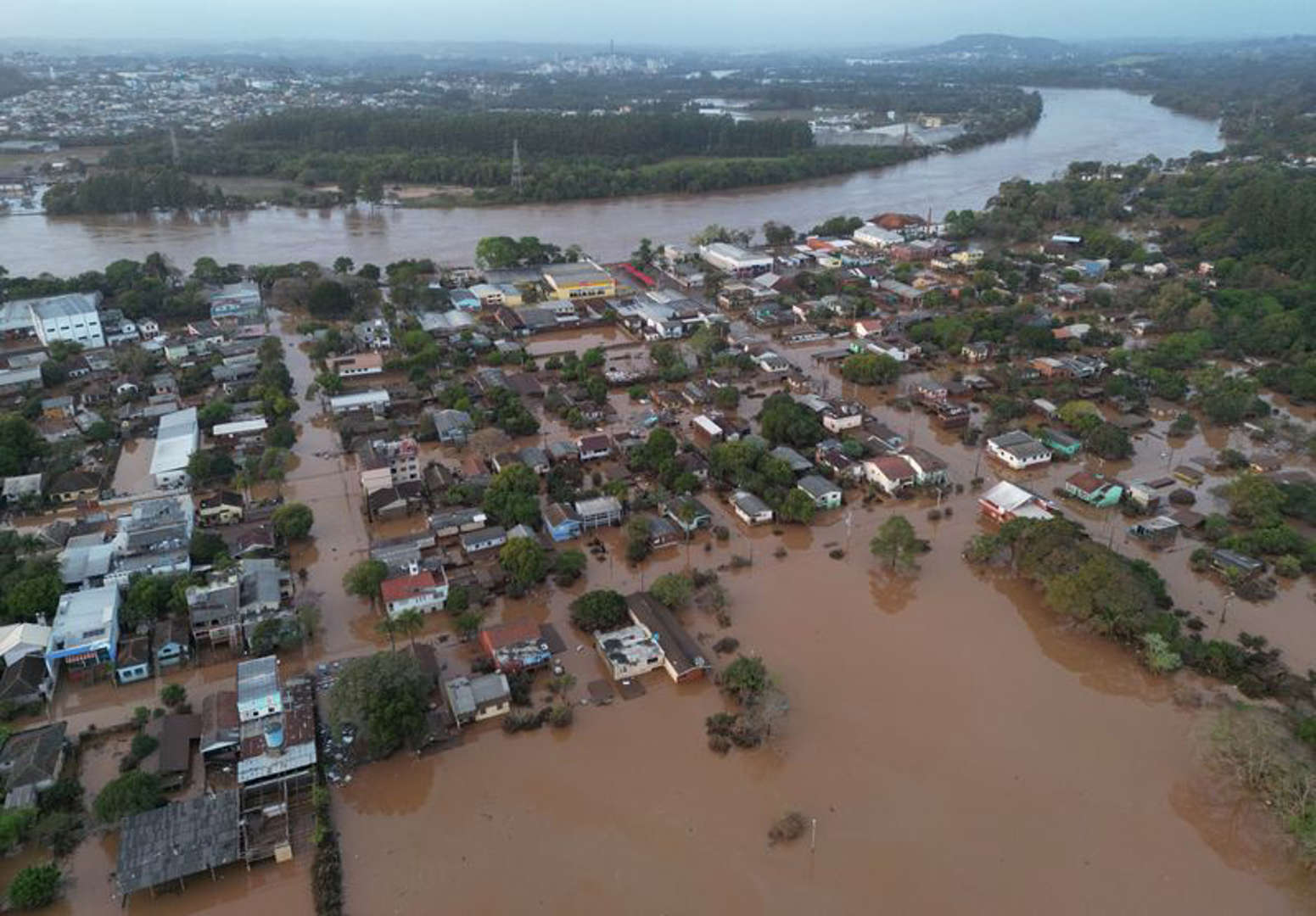 Aerial view of houses in a flooded area after an extratropical cyclone hit southern cities, in Lajeado, Rio Grande do Sul state, Brazil, 6 September 2023. Photo: Diego Vara / REUTERS