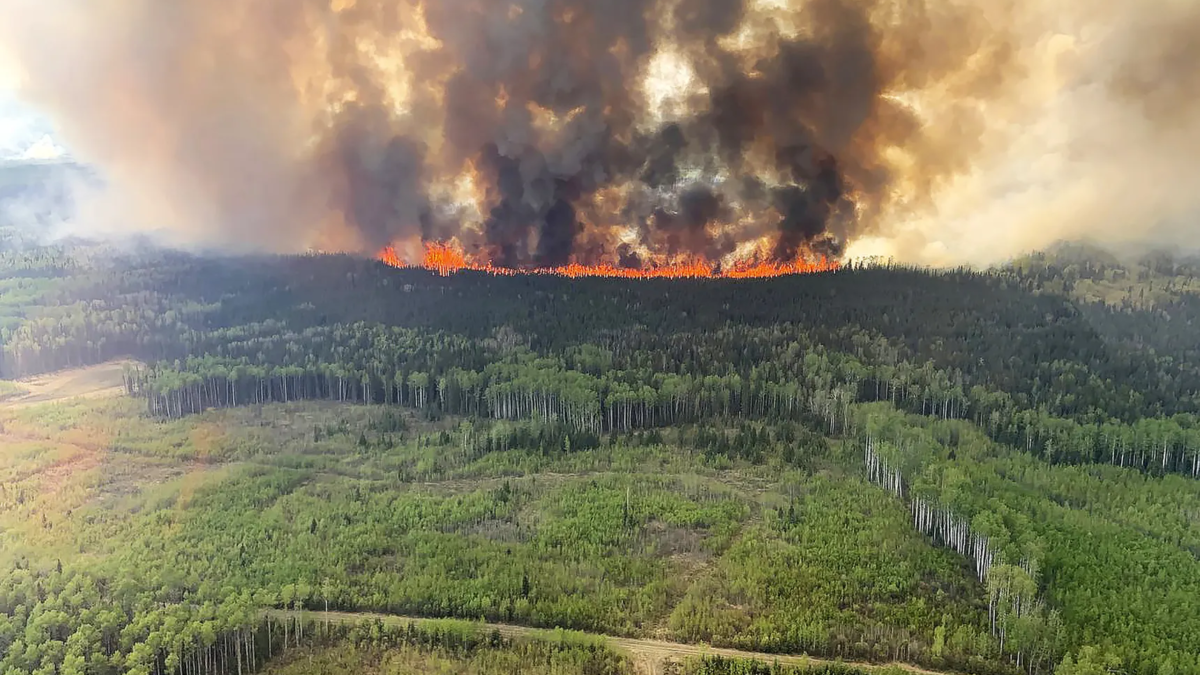 The Bald Mountain Wildfire burns in the Grande Prairie Forest Area in Alberta on 12 May 2023. Government of Alberta Fire Service / Canadian Press / AP