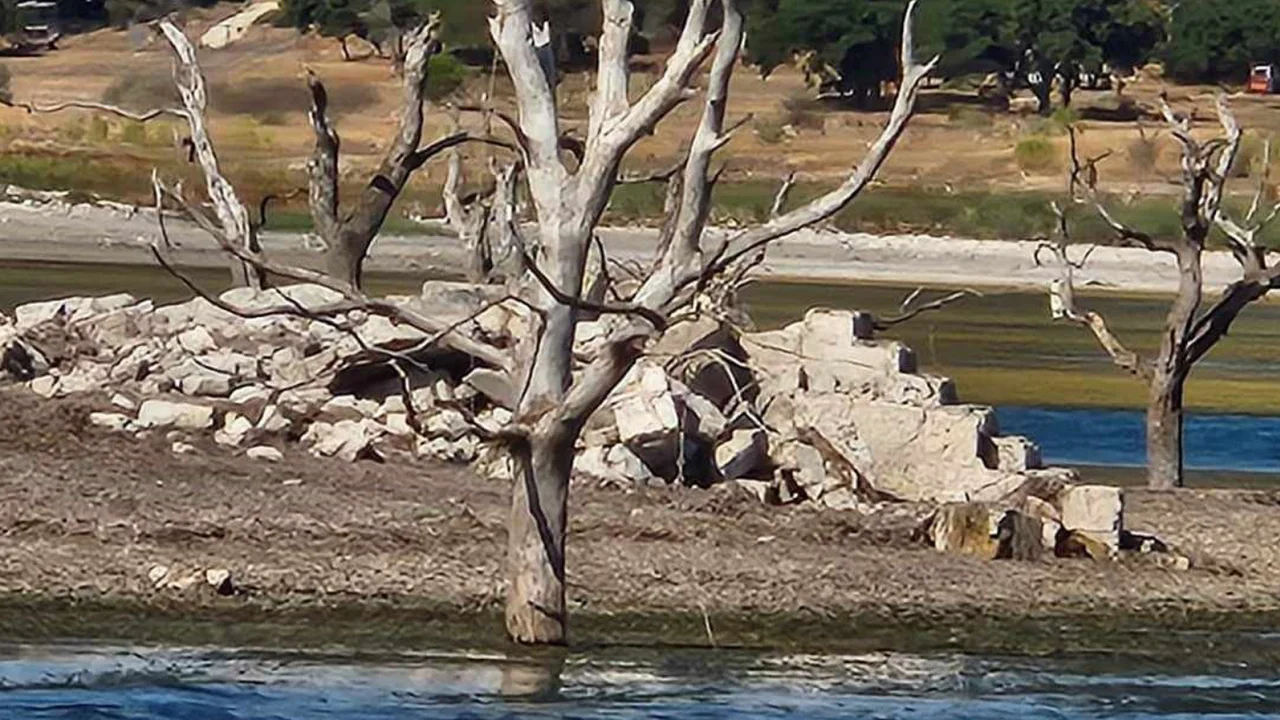 A bridge and rubble from a previous house that was underwater at Canyon Lake in Texas reappeared in 2023 due to historically low water levels. Photo: JM Perez / CNN
