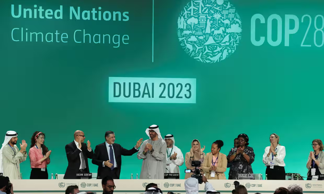 COP28 president Sultan Ahmed Al Jaber, center, hailed the adoption of the key text, calling it the “UAE consensus”. Photo: Amr Alfiky / Reuters