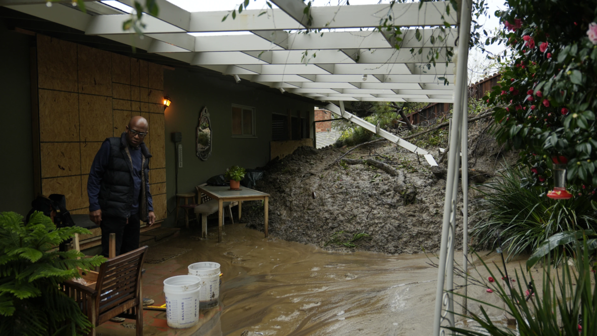Prentice Sinclair Smith a friend of home owner Dion Peronneau says she was awoken by the sound of cracking around 4 a.m. early morning Monday, as mudflow forced its way into her home in the Baldwin Hills area of Los Angeles, Tuesday, 6 February 2024. One of the wettest storms in Southern California history unleashed more than 300 mudslides in the Los Angeles area after dumping more than half of the city’s seasonal rainfall in just two days, and officials warned Tuesday that the threat hadn’t passed yet. Photo: Damian Dovarganes / AP Photo
