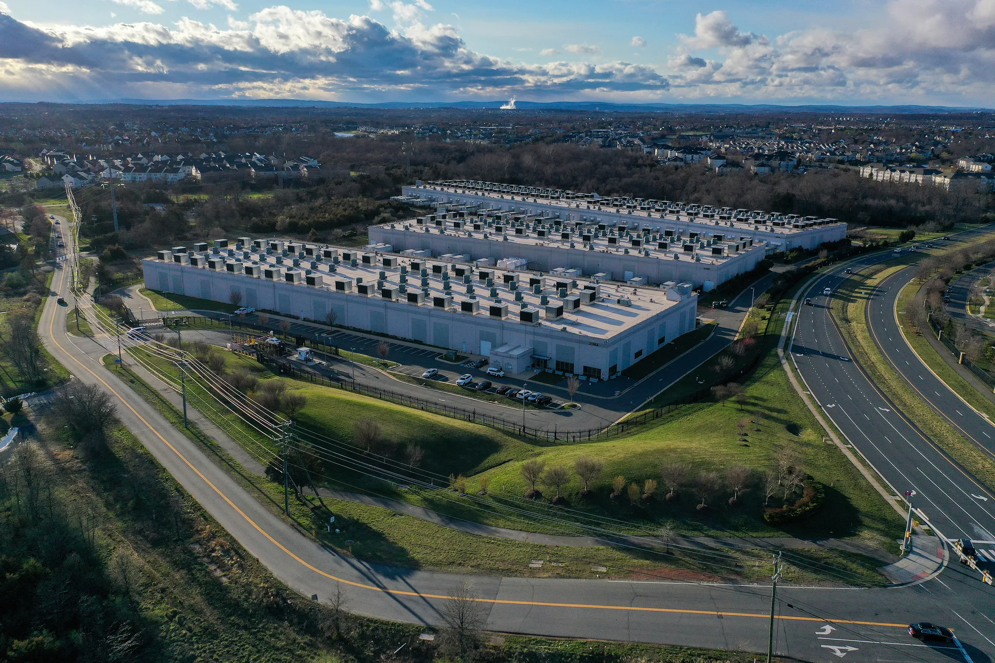 Aerial view of data centers in Ashburn, Virginia, 10 March 2024. At least 75 data centers have opened in Virginia since 2019. Photo: Nathan Howard / The New York Times