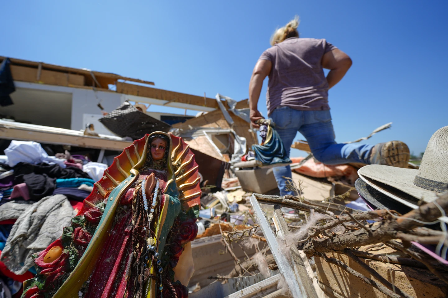 A Guadalupe Virgin statue lays among the rubble of the destroyed home of Juana Landeros, who rode out a deadly tornado with her husband and her 9-year-old son when it rolled through the previous night, Sunday, 26 May 2024, in Valley View, Texas. Powerful storms left a wide trail of destruction Sunday across Texas, Oklahoma and Arkansas after obliterating homes and destroying a truck stop where drivers took shelter during the latest deadly weather to strike the central U.S. Photo: Julio Cortez / AP Photo