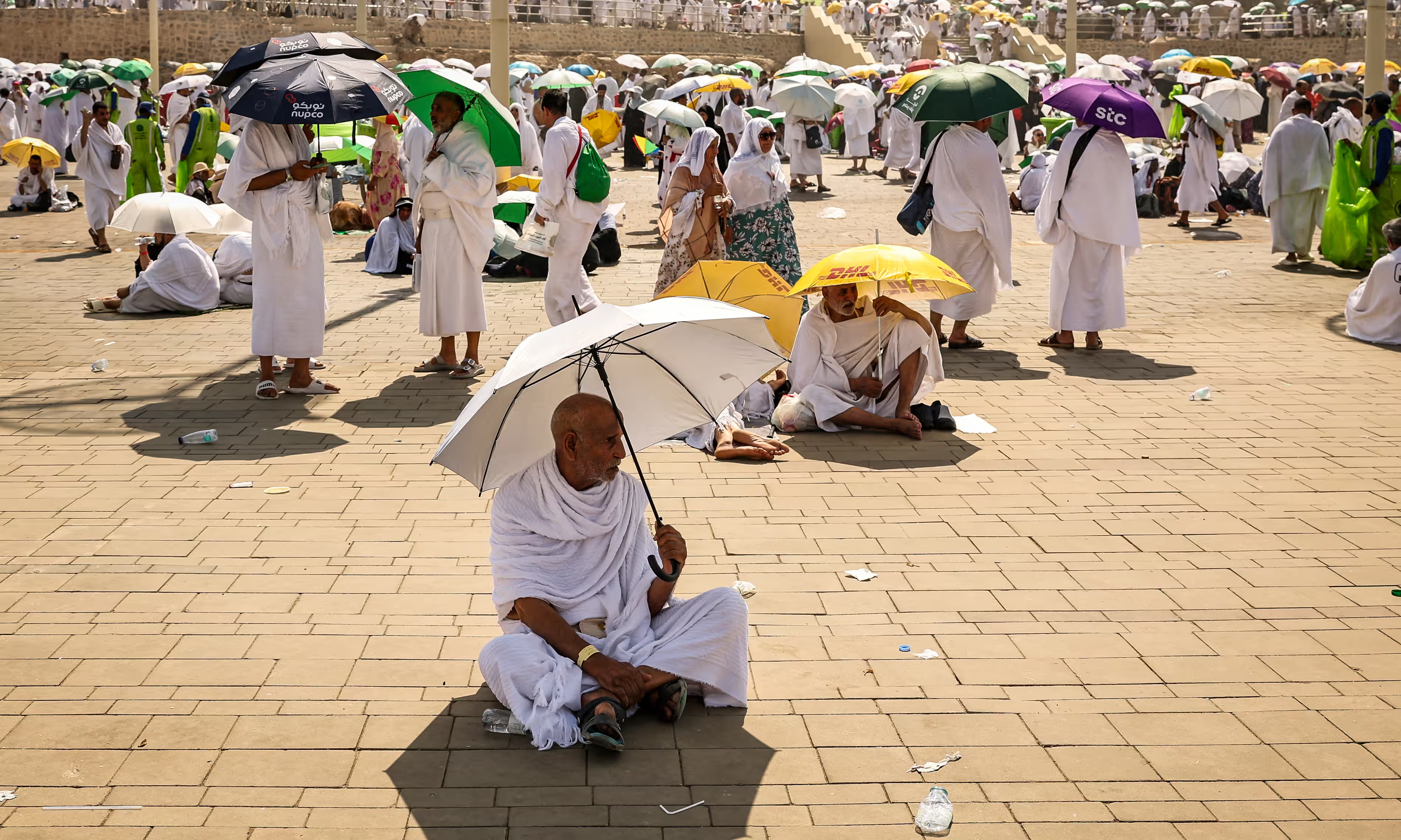 Pilgrims using umbrellas for shade as they arrived at the base of Mount Arafat, also known as Jabal al-Rahma or Mount of Mercy, during the hajj. Photo: Fadel Senna / AFP / Getty Images