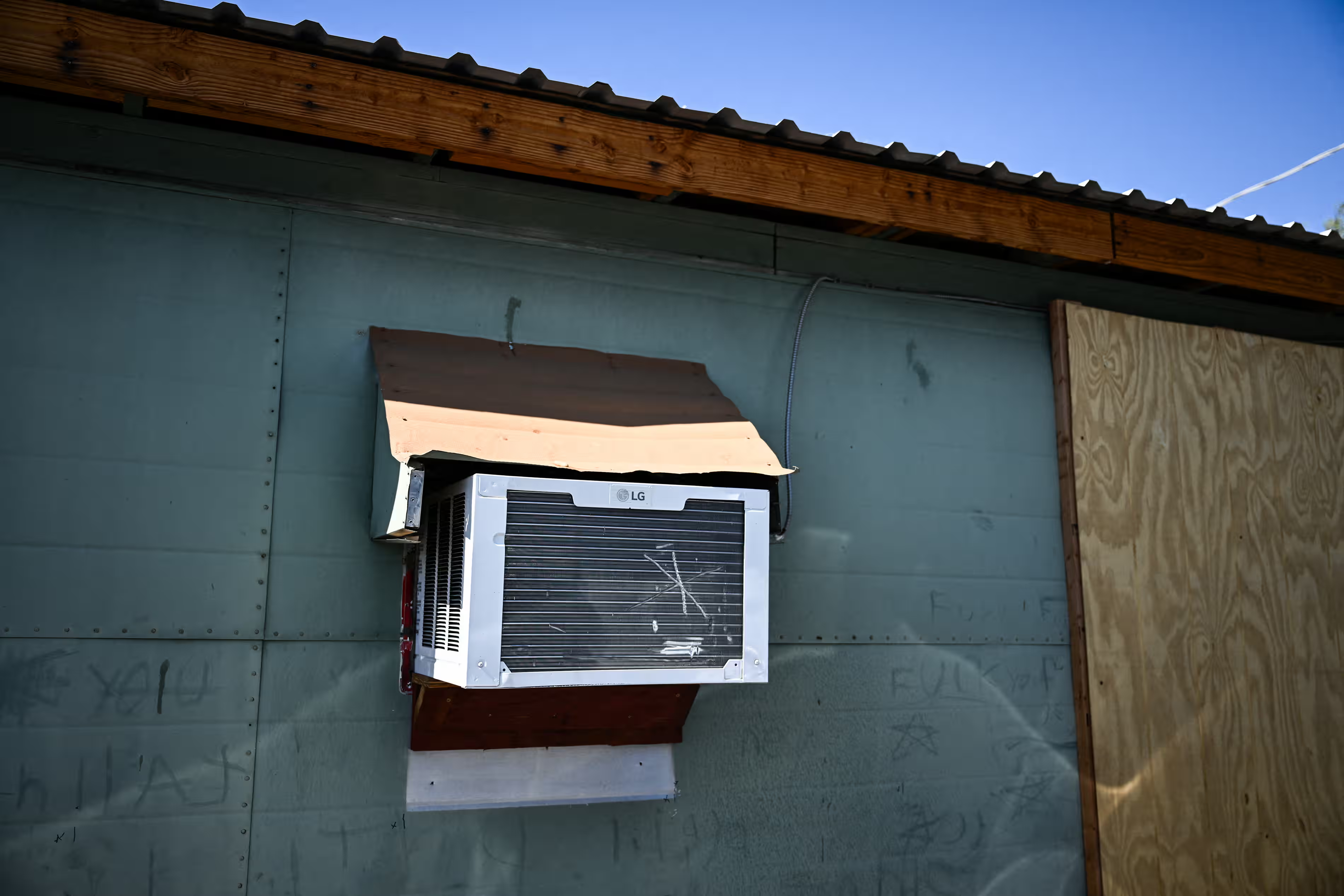 An air-conditioning unit in a home during a record heatwave in Phoenix, Arizona, on 19 July 2023. Photo: Patrick T Fallon / AFP / Getty Images