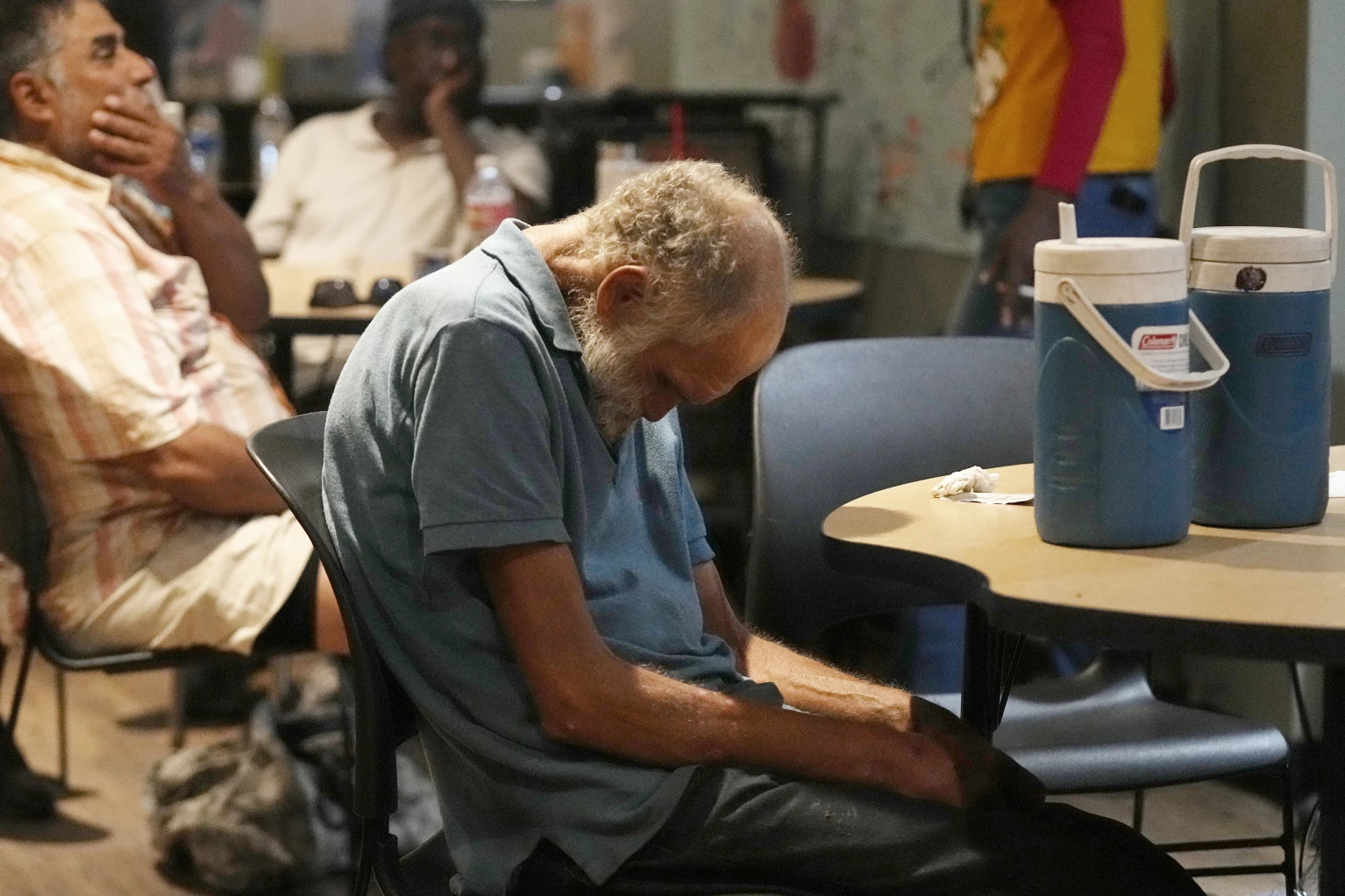 Patrons try to cool off inside at the Justa Center as temperatures were expected to hit 116 degrees Fahrenheit, on 18 July 2023, in Phoenix. Photo: Ross D. Franklin / AP Photo