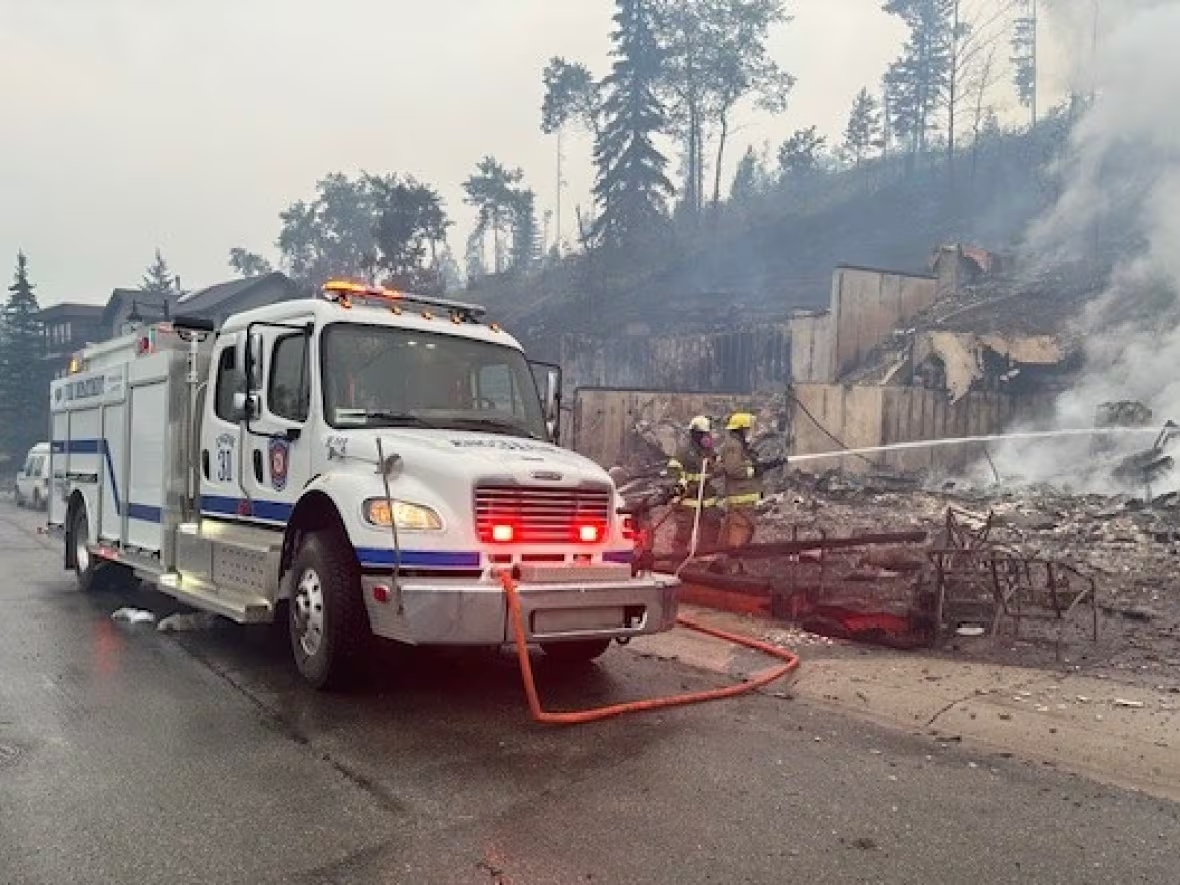 Firefighters are pictured in Jasper, Alberta, Canada in a Facebook post shared by Woodlands County on Thursday, 25 July 2024. Four crew members, Engine 31 and a command unit were dispatched to Jasper to help, it stated. Photo: Woodlands County / Facebook