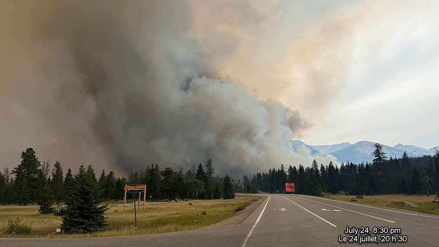 In this 24 July 2024 image obtained from the Jasper National Park in Canada, smoke rises from a wildfire burning in the park. Photo: Jasper National Park / AFP / Getty Images