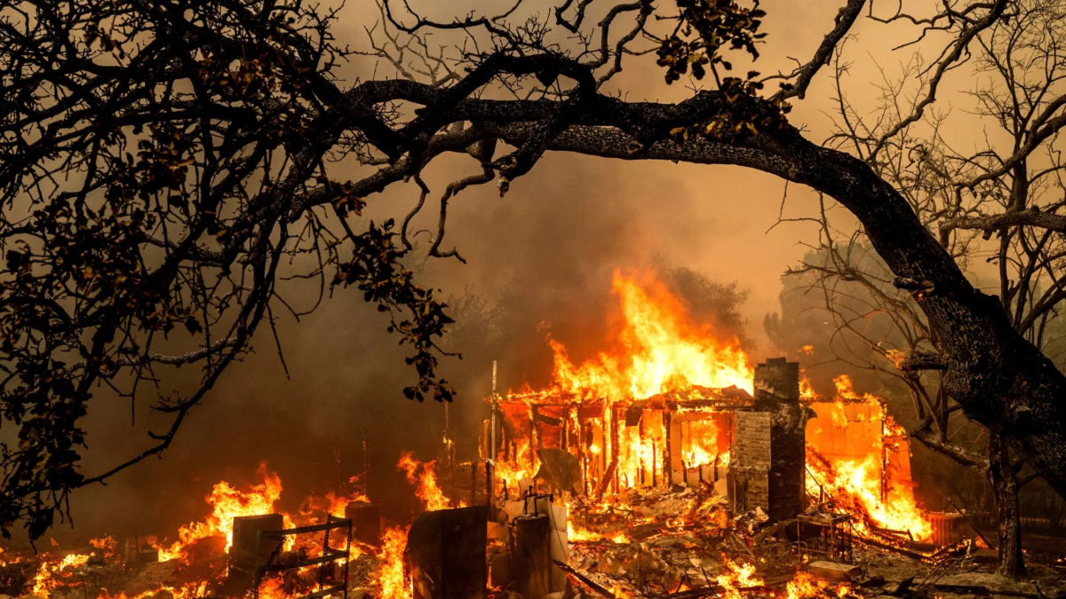 Flames consume a home on Bessie Lane as the Thompson Fire burns in Oroville, California, Tuesday, 2 July 2024. An extended heat wave blanketing Northern California resulted in red flag fire warnings and power shutoffs. Photo: Noah Berger / AP Photo