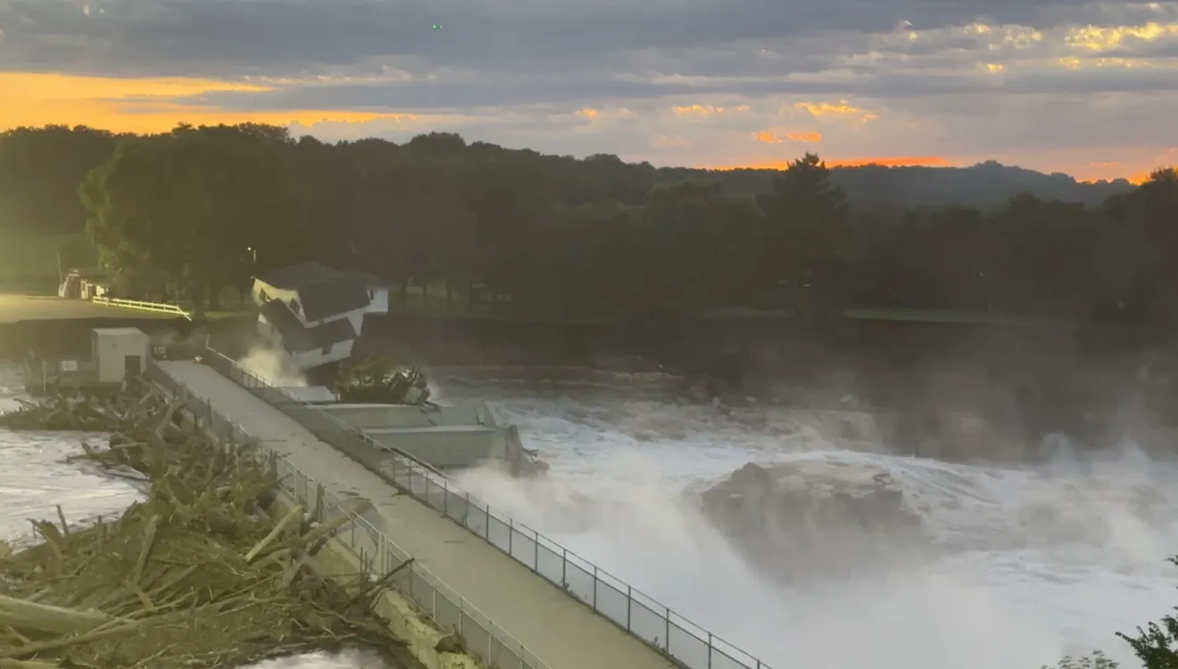 Part of a house falls into Blue Earth River next to the Rapidan Dam in Mankato, Minnesota, on 25 June 2024, in this still image obtained from social media video. Photo: AW AERIAL / REUTERS