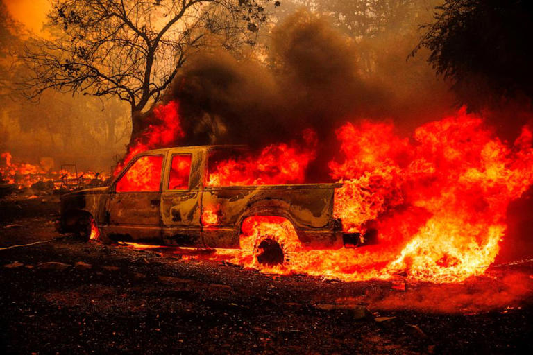 A property is engulfed in flames as the Thompson Fire burns, Tuesday, 2 July 2024, in Oroville, California. Photo: Ethan Swope / AP