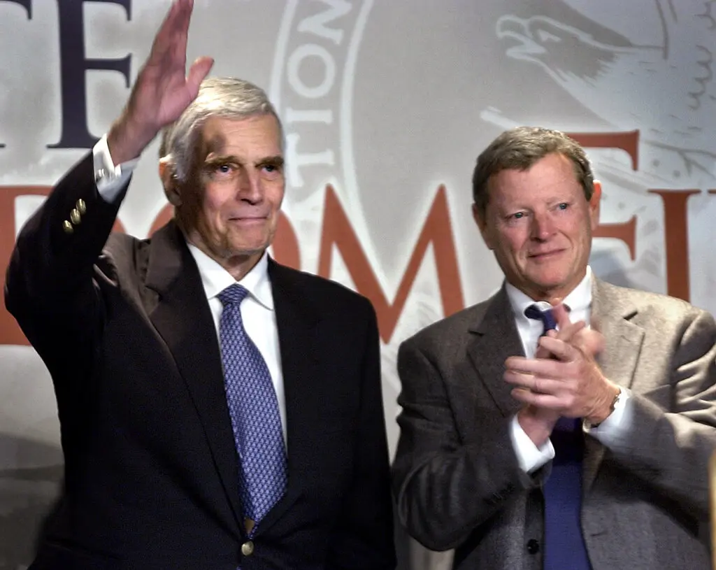 James M. Inhofe, right, with the actor and National Rifle Association president Charlton Heston at an N.R.A. rally in Oklahoma City in 2002. Photo: Bryan Terry / The Daily Oklahoman / Associated Press