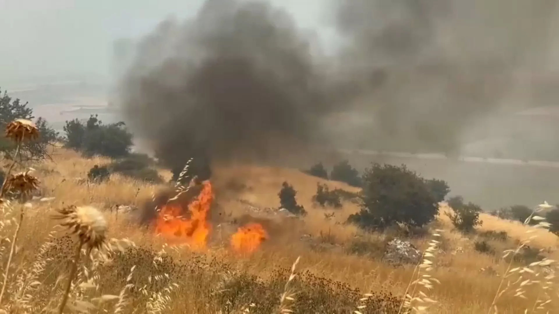 A wildfire burns in a remote part of the southern district of Dropull, Albania on 11 July 2024. Screenshot from AP video 4505535. Photo: AP